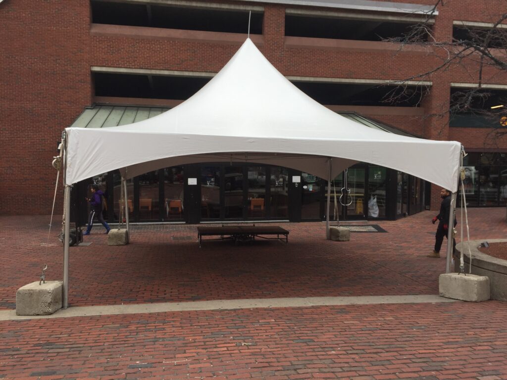Tent on pavement, tent on brick