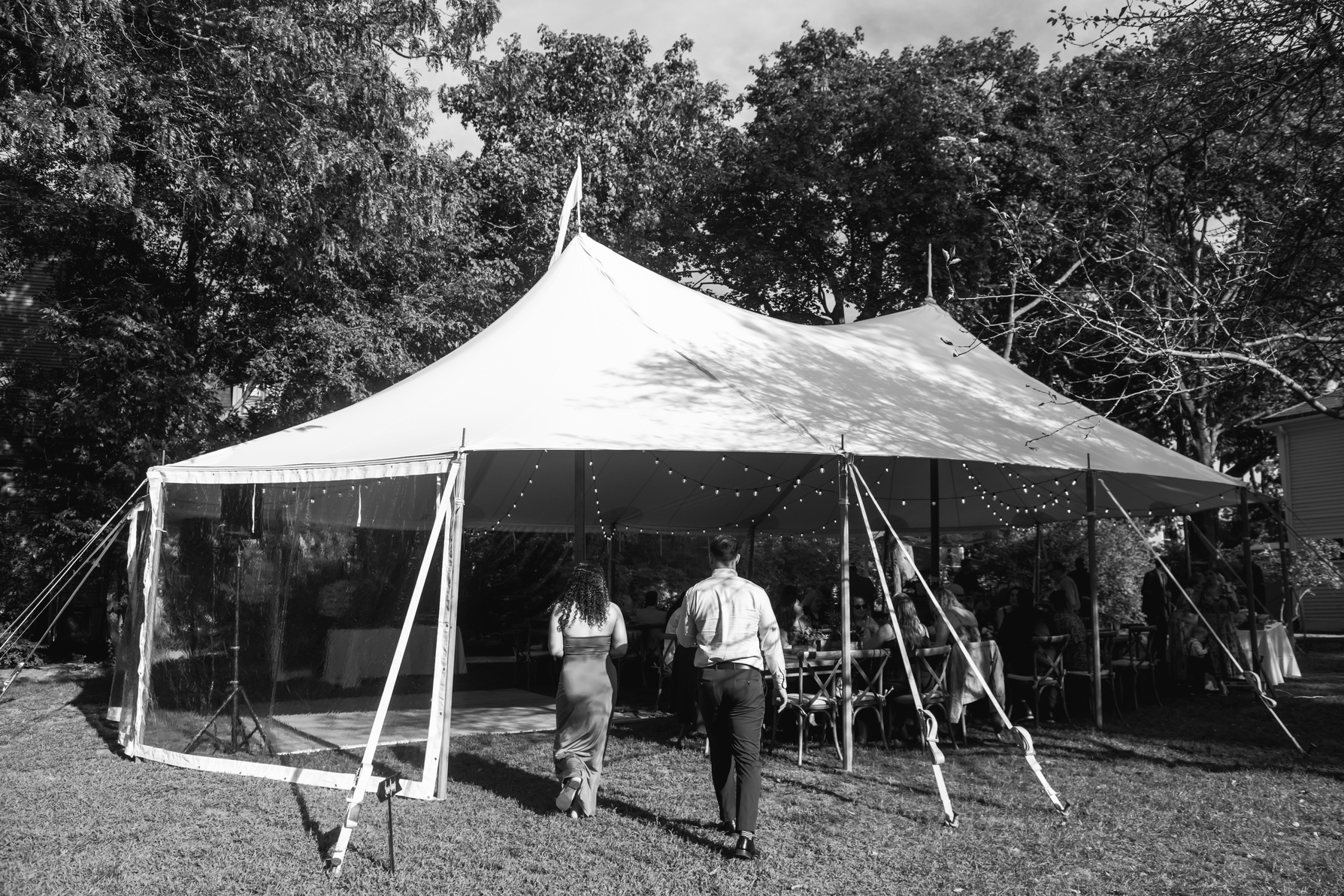 Clear roll-up sidewalls on a Baystate Tent & Party sailcloth tent