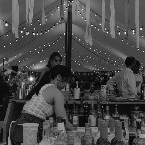 sailcloth tent wedding with ambient lighting